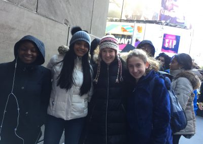 Aditi Patil posing with her friends in New York City